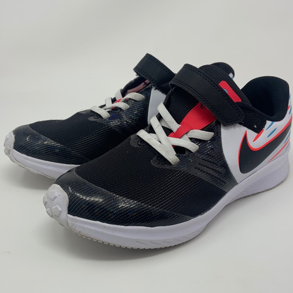 Kids Nike tennis shoes.